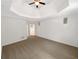 Neutral bedroom with plush carpet and a unique ceiling fan, offering a blank canvas for personalization at 3083 Milledge Gate Se Ct, Marietta, GA 30067