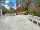 Large outdoor deck with multiple seating areas at 3083 Milledge Gate Se Ct, Marietta, GA 30067
