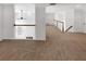 Hallway featuring neutral carpet, white walls, and wooden railing at 3083 Milledge Gate Se Ct, Marietta, GA 30067