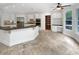 Bright kitchen with white cabinets, stainless steel appliances, granite countertops, and a large island at 3083 Milledge Gate Se Ct, Marietta, GA 30067