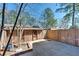 Backyard with a small brick shed at 748 Garden View Dr, Stone Mountain, GA 30083