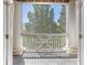 Charming balcony with white pillars and wooden railing, offering serene outdoor views at 1955 Nocturne Dr # 3301, Alpharetta, GA 30009
