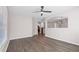 Living room with large window and a ceiling fan at 1955 Nocturne Dr # 3301, Alpharetta, GA 30009