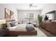Comfortable main bedroom with stylish decor, including a large bed and modern furniture at 1955 Nocturne Dr # 3301, Alpharetta, GA 30009
