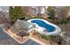 Aerial view of the community pool covered for the off season at 1955 Nocturne Dr # 3301, Alpharetta, GA 30009