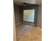 Bedroom with gray walls, neutral carpet, and a frosted window at 390 17Th St # 2059, Atlanta, GA 30363