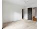 Spacious bedroom with neutral carpet and access to other rooms at 5245 Kenbrook Way, Sandy Springs, GA 30327
