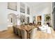 Open-concept great room featuring a formal dining room and a cozy sitting area at 5245 Kenbrook Way, Sandy Springs, GA 30327