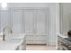 Custom kitchen with marble countertops, designer hardware, and floor to ceiling cabinets at 5245 Kenbrook Way, Sandy Springs, GA 30327