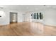 Bright living room featuring hardwood floors, recessed lighting and a window with black trim at 5245 Kenbrook Way, Sandy Springs, GA 30327