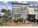 Cozy backyard patio with seating, grill, and manicured shrubs at 5726 Taylor Way, Sandy Springs, GA 30342