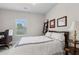 Bedroom featuring natural light, a study desk, and decorative wall hangings at 5726 Taylor Way, Sandy Springs, GA 30342