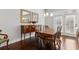 Dining room area with hardwood floors, chandelier, and natural light at 5726 Taylor Way, Sandy Springs, GA 30342