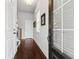 Welcoming entryway with hardwood floors, white trim, and a stylish front door at 5726 Taylor Way, Sandy Springs, GA 30342