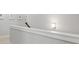 Bright hallway with white trim and neutral walls at 5726 Taylor Way, Sandy Springs, GA 30342