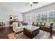 Inviting living room featuring a comfortable seating arrangement and natural light at 5726 Taylor Way, Sandy Springs, GA 30342