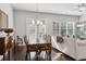Bright, open-concept living and dining area featuring hardwood floors and natural light at 5726 Taylor Way, Sandy Springs, GA 30342