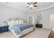Large primary bedroom with decorative accents and abundant natural light at 5726 Taylor Way, Sandy Springs, GA 30342