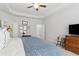 Serene primary bedroom with neutral decor and a tray ceiling at 5726 Taylor Way, Sandy Springs, GA 30342