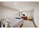 Minimalist bedroom with natural light, simple furnishings, and hardwood floors creating a serene and inviting atmosphere at 595 Overbrook Nw Dr, Atlanta, GA 30318
