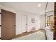 This bedroom has a four-poster bed, white walls, and two large closets at 595 Overbrook Nw Dr, Atlanta, GA 30318