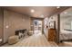Bedroom features fireplace with patterned tile surround, sliding doors to deck and dresser with a unique design at 595 Overbrook Nw Dr, Atlanta, GA 30318