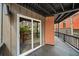 A beautiful deck with wood flooring and view of trees and the neighboring building at 595 Overbrook Nw Dr, Atlanta, GA 30318