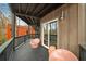 Outdoor deck with comfortable seating and picturesque views of mature trees provides a relaxing escape at 595 Overbrook Nw Dr, Atlanta, GA 30318