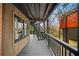 Exterior deck with stairs leading to the upper level and a view of the surrounding landscape at 595 Overbrook Nw Dr, Atlanta, GA 30318