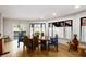 Dining room featuring hardwood floors, many windows, and a large marble dining table at 595 Overbrook Nw Dr, Atlanta, GA 30318