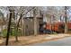 Unique home design with multi-level decks nestled among the trees at 595 Overbrook Nw Dr, Atlanta, GA 30318