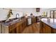 Kitchen area showcasing a custom island, counters, and wood cabinets at 595 Overbrook Nw Dr, Atlanta, GA 30318