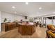 Open kitchen showcasing a large island, custom cabinetry, modern appliances, and ample counter space for cooking and dining at 595 Overbrook Nw Dr, Atlanta, GA 30318
