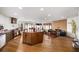 Open-concept kitchen and living room featuring a fireplace and custom island at 595 Overbrook Nw Dr, Atlanta, GA 30318