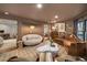 Cozy living room with unique furniture arrangement, neutral color palette, and large windows offering plenty of natural light at 595 Overbrook Nw Dr, Atlanta, GA 30318