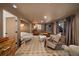 Stylish living room with large windows, ample seating, and eclectic decor for a comfortable atmosphere at 595 Overbrook Nw Dr, Atlanta, GA 30318