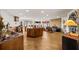 Open-concept kitchen and living area with hardwood floors and access to natural light at 595 Overbrook Nw Dr, Atlanta, GA 30318