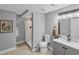 Well-designed bathroom with a walk-in shower, updated vanity, and neutral color scheme at 656 Channing Nw Dr, Atlanta, GA 30318