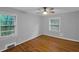 Bright bedroom with hardwood floors and large windows offering natural light at 656 Channing Nw Dr, Atlanta, GA 30318