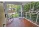 Inviting screened porch with natural light and exterior view is perfect for relaxing at 656 Channing Nw Dr, Atlanta, GA 30318