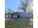 Charming single-story home with a cozy screened-in porch and well-maintained landscaping at 1672 Thornton Pl, Atlanta, GA 30315