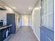 Modern kitchen featuring stainless steel appliances and sleek, updated fixtures and wood-look floors at 1672 Thornton Pl, Atlanta, GA 30315