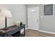 A stylish entryway features a modern console table, elegant lamp, and neutral decor at 2792 Toney Dr, Decatur, GA 30032