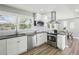 Well-appointed kitchen with stainless steel appliances, granite countertops, and ample cabinet space at 2792 Toney Dr, Decatur, GA 30032
