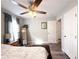 Comfortable bedroom with updated flooring, neutral tones, and a ceiling fan for added comfort at 2985 Catalina Dr, Decatur, GA 30032