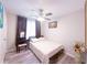 A cozy bedroom with a bed, desk, and ample natural light at 2985 Catalina Dr, Decatur, GA 30032