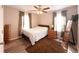 Cozy bedroom with neutral walls, modern flooring, and a large window offering natural light at 2985 Catalina Dr, Decatur, GA 30032