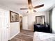 Comfortable bedroom with a ceiling fan and decorative furnishings at 2985 Catalina Dr, Decatur, GA 30032