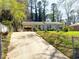 Charming single-story home with a well-maintained front yard and a convenient covered carport at 2985 Catalina Dr, Decatur, GA 30032
