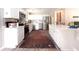 Updated kitchen with stainless steel appliances, white cabinets, and a modern countertop island at 2985 Catalina Dr, Decatur, GA 30032